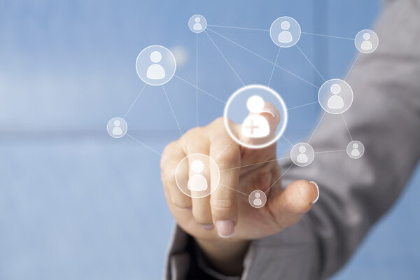 Businesswoman in front of visual touch screen. 