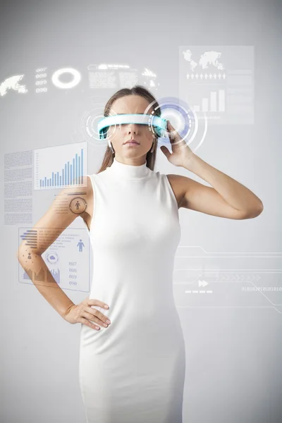 Beautiful woman with futuristic glasses — Stock Photo, Image