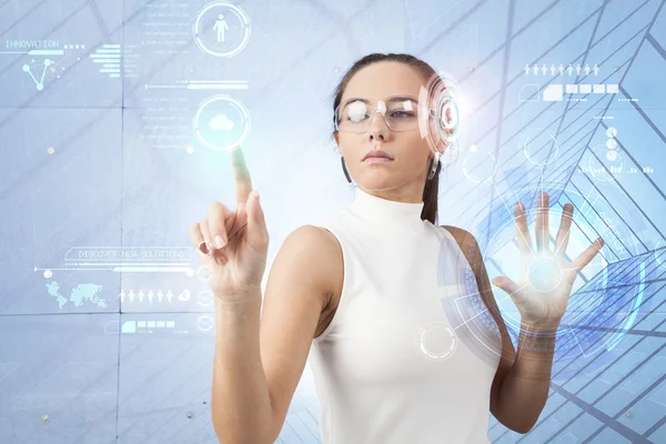 Woman touching the virtual future interface — Stock Photo, Image