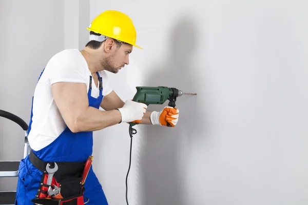 Trabajador Que Perfora La Calzada Concreta Con El Martillo Perforador  Reparación Del Hombre Imagen de archivo - Imagen de eléctrico, trabajador:  97103583