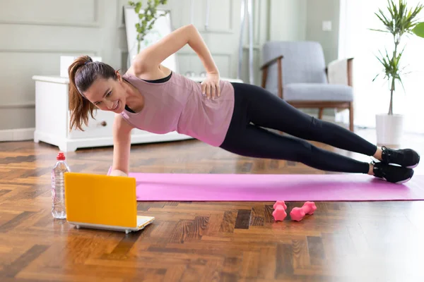 Young Woman Exercising Home Living Room Video Lesson She Repeating — Stock Photo, Image