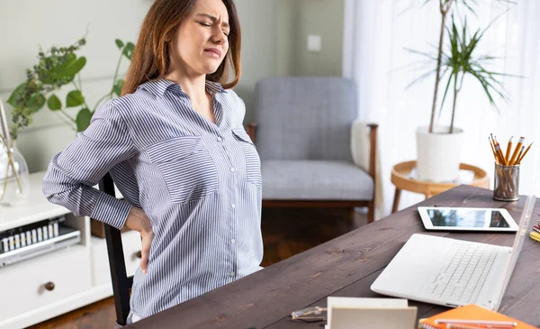 Freelancer Young Woman Suffering Back Pain While Working Her Office — Stock Photo, Image