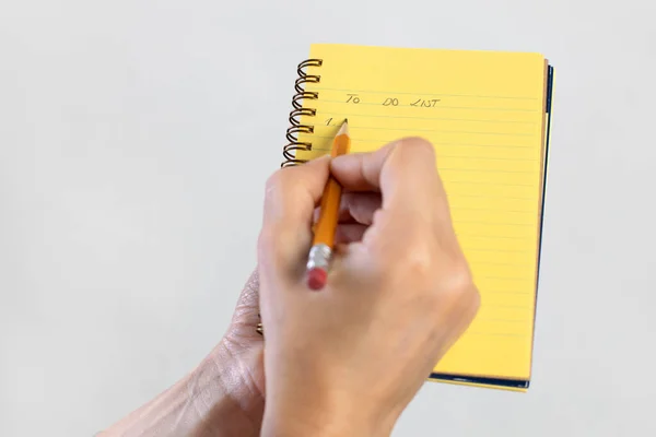 Close Vrouwelijke Hand Voor Bereiden Doen Lijst Notebook — Stockfoto