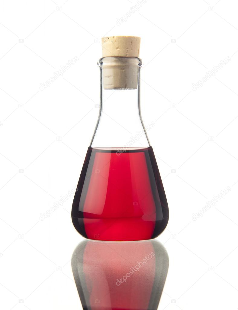 Flask with red liquid