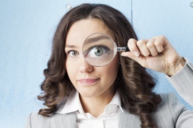 Woman with magnifying glass clipart