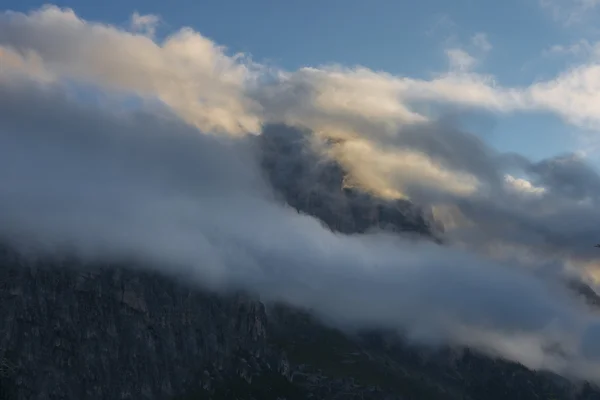 Mount Sass de Stria with clouds and fog at sunrise, Dolomites, Veneto, Italy — Stock Photo, Image