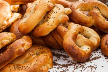 Freshly baked bread rolls with caraway seeds