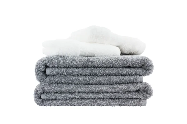 Pilha de toalhas de banho. Isolado sobre branco — Fotografia de Stock