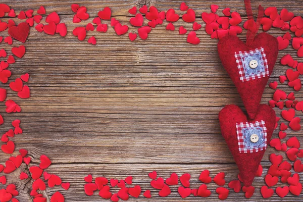 Valentines Day background with red hearts. Toned