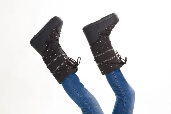 Underhållande svart vinter moon boots. — Stockfoto