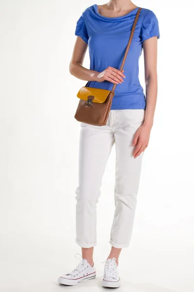 White trousers and brown purse. — Stockfoto