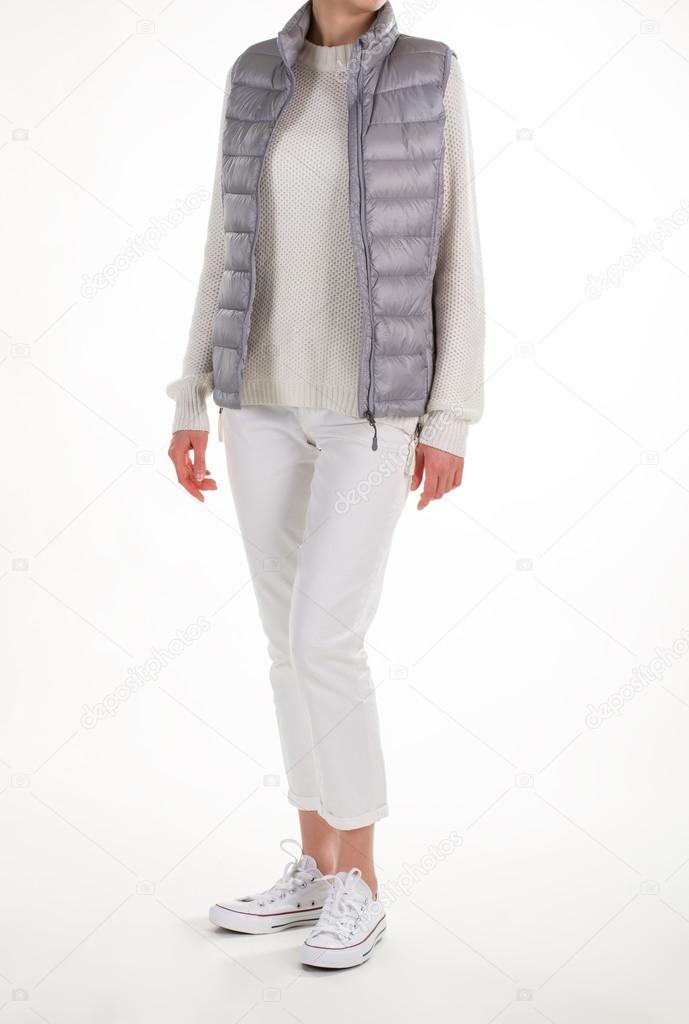 Young woman in warm vest.