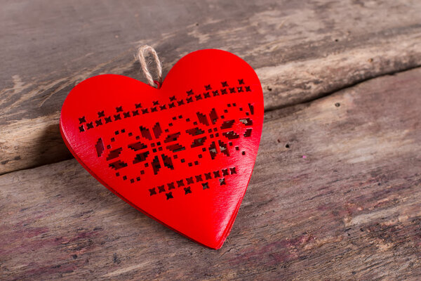 Red heart with ornament.