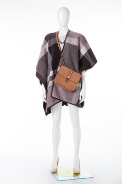 Poncho on mannequin.