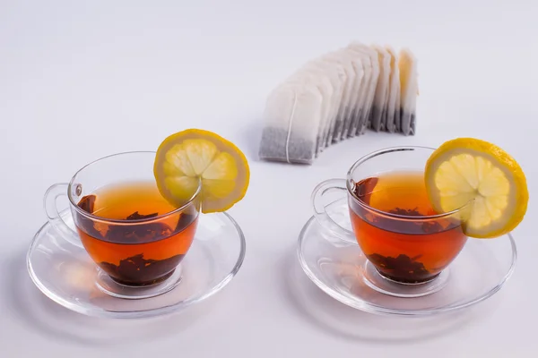 Two cups of black tea — Stock Photo, Image