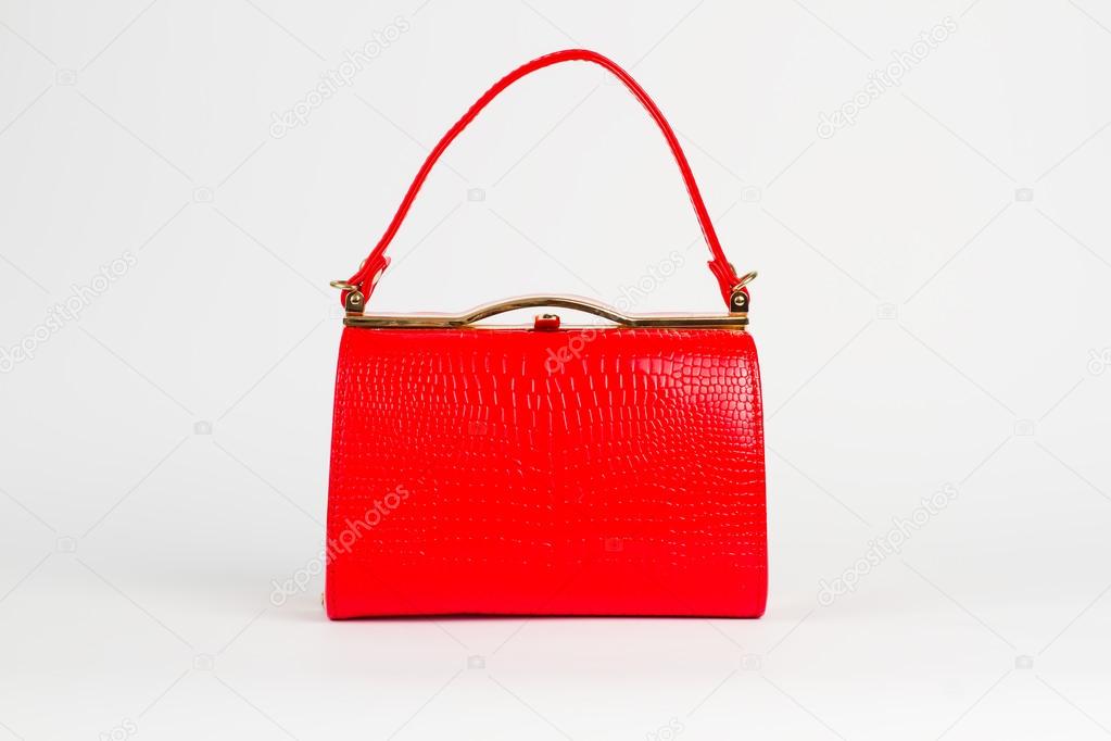 Fashionable red handbag.