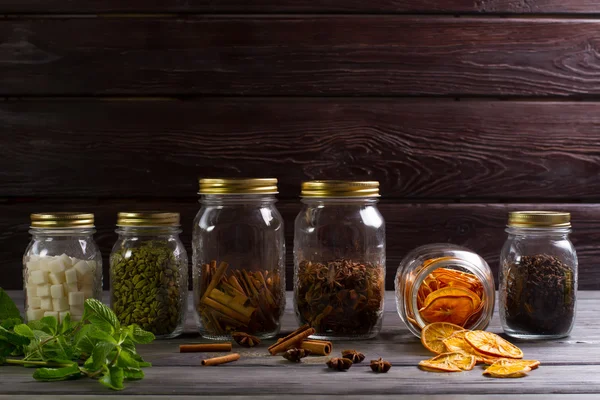 Exclusive jars with spices for tea. — Stock Photo, Image