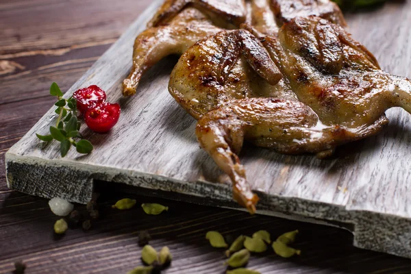 Two roasted quails. — Stok fotoğraf