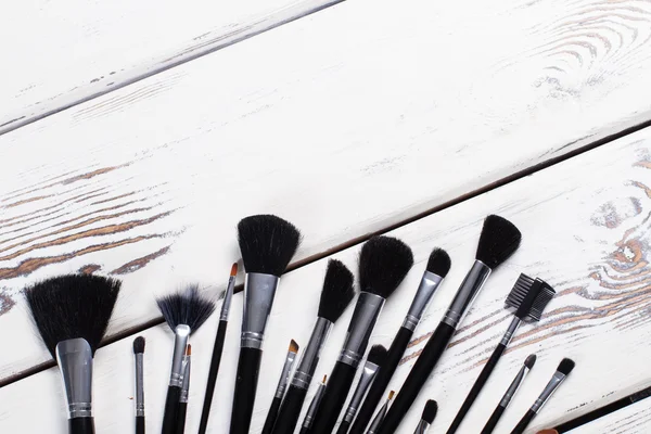 Black natural makeup brushes. — Stock Photo, Image