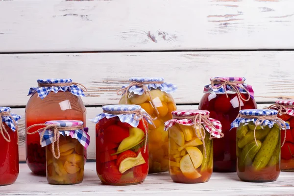 Glass jars with canned products. — Stock Photo, Image