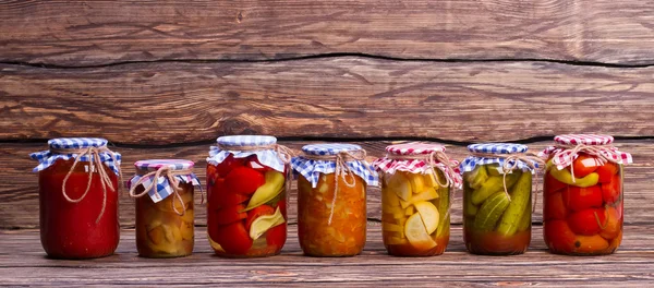 Organic vegetables in jars. — Stock Photo, Image