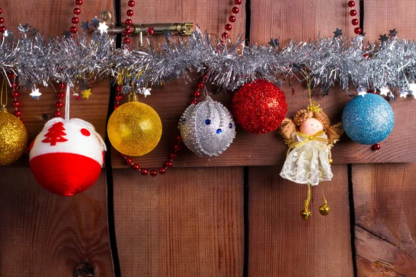 Christmas balls on fence. — Stock Photo, Image