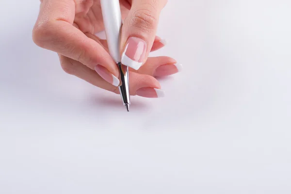 Close-up de manicure e caneta . — Fotografia de Stock