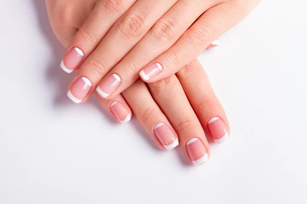 Manicura ordenada sobre un fondo blanco . — Foto de Stock