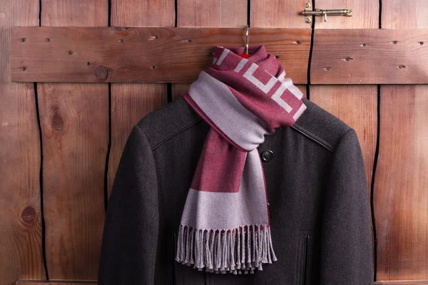 Men's clothes hanging on a wooden fence. — Stock Photo, Image