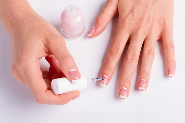 Girl paints her nails. — Stock Photo, Image