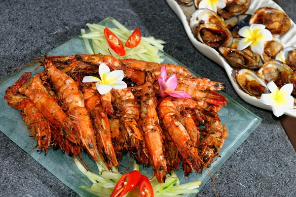 Grilled king prawns and shells — Stock Photo, Image