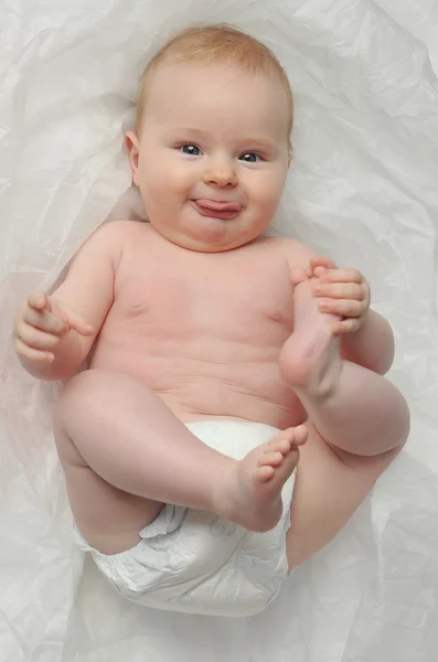 7 month baby girl in diaper — Stock Photo, Image