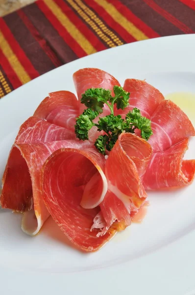 Slices of Italian prosciutto — Stock Photo, Image