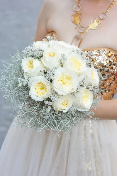 Bride holding wedding bouquet