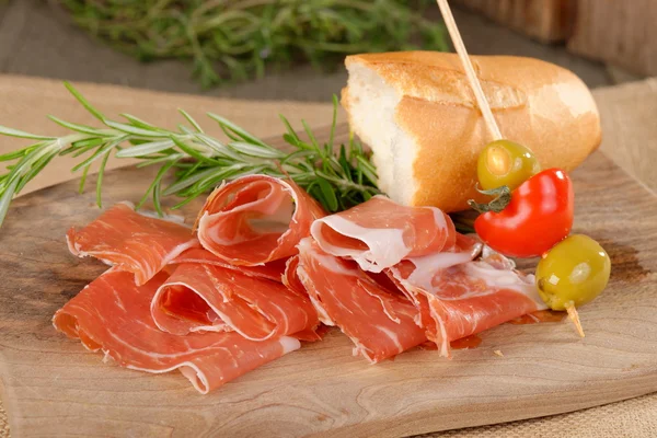 Delicious prosciutto slices — Stock Photo, Image