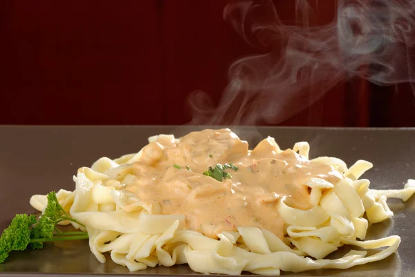 Creamy sauce with pasta — Stock Photo, Image