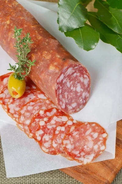 Salami with olive — Stock Photo, Image