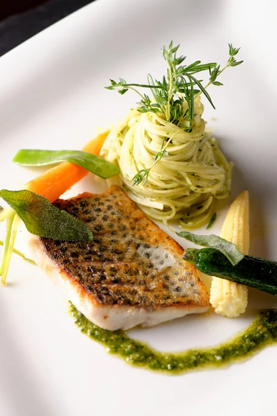 Trout fish fillet breaded in herbs — Stock Photo, Image