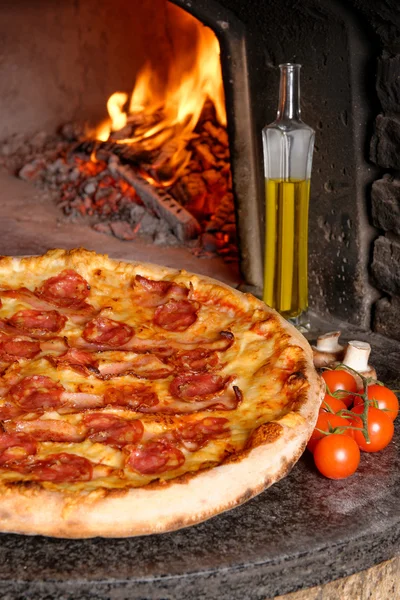 Baked tasty pizza with salami — Stock Photo, Image
