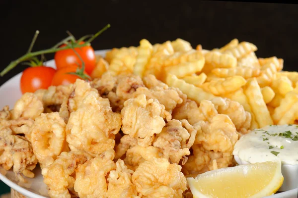 Fried calamari with french fries — Stock Photo, Image