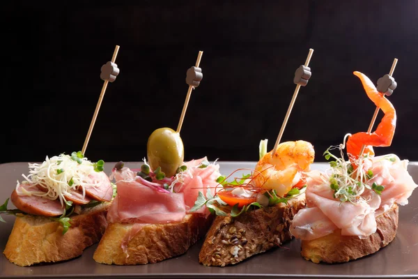 Tapas on Crusty Bread — Stock Photo, Image