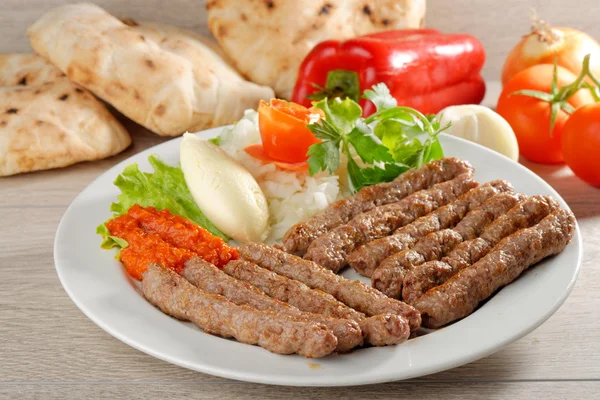 Cevapcici, a small skinless sausages — Stock Photo, Image