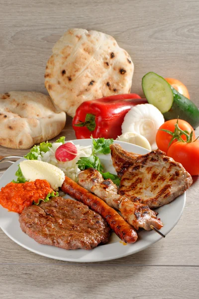 Mixed grill on a plate — Stock Photo, Image