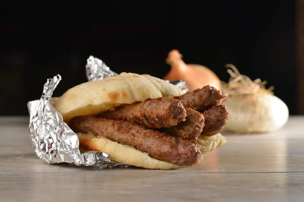 Traditional cevapcici with ajvar — Stock Photo, Image