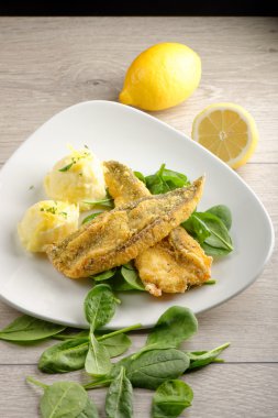 Fillet of sea bream with mashed potatoes clipart