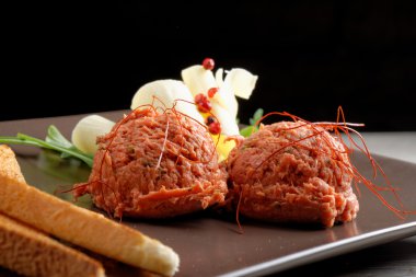 Tasty beef tartare with toast bread