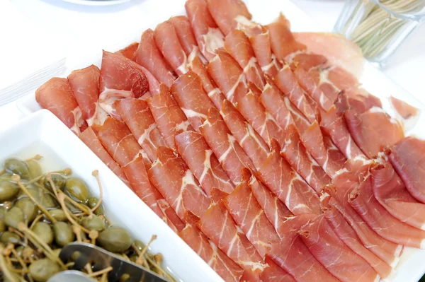 A plate with spanish serrano ham — Stock Photo, Image