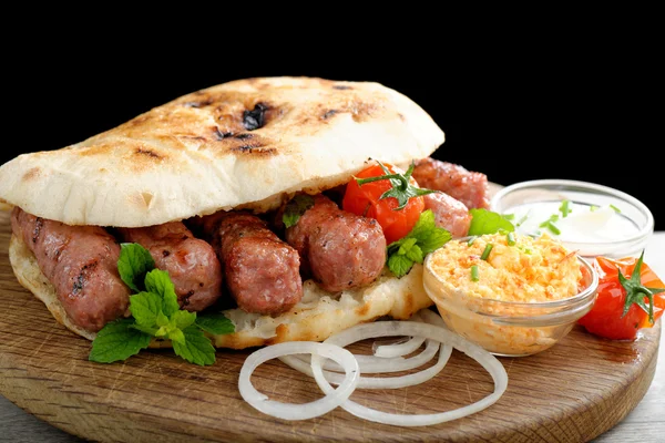 Cevapcici, a small skinless sausages — Stock Photo, Image