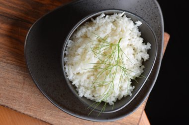 A bowl of perfectly cooked, plain Basmati rice clipart
