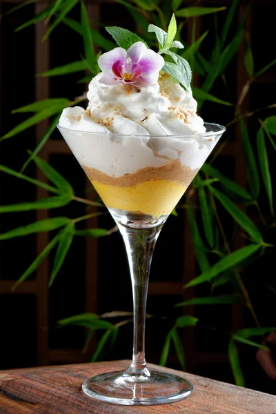 Passion fruit ice cream with almond cream — Stock Photo, Image
